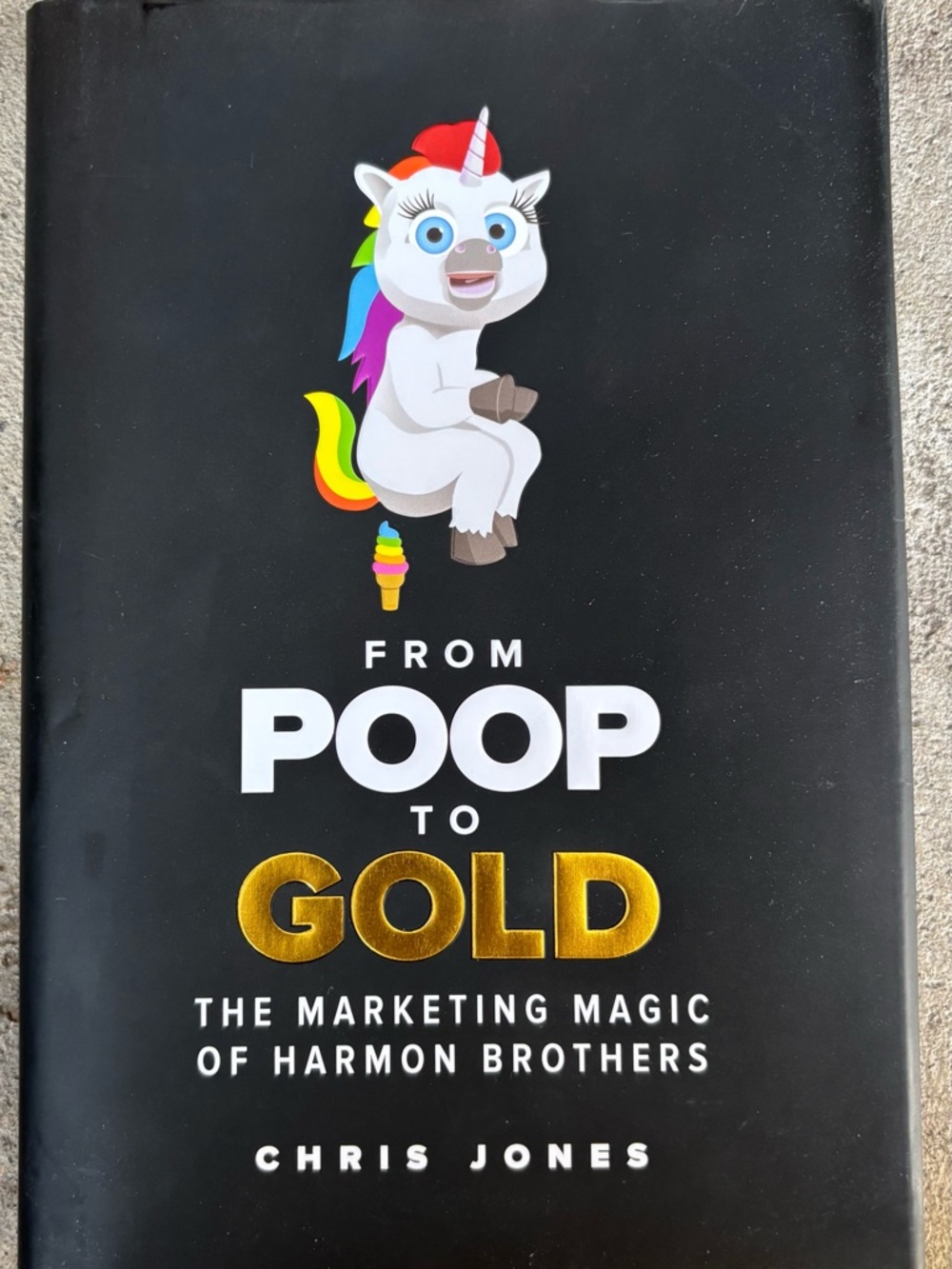 From Poop to Gold by Chris Jones - Black Cover with Rainbow Unicorn